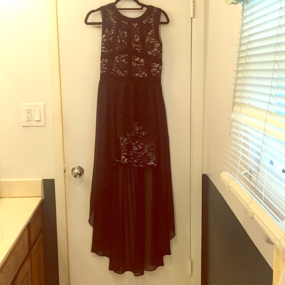 Morgan & Co prom dress with a sheer high-low skirt